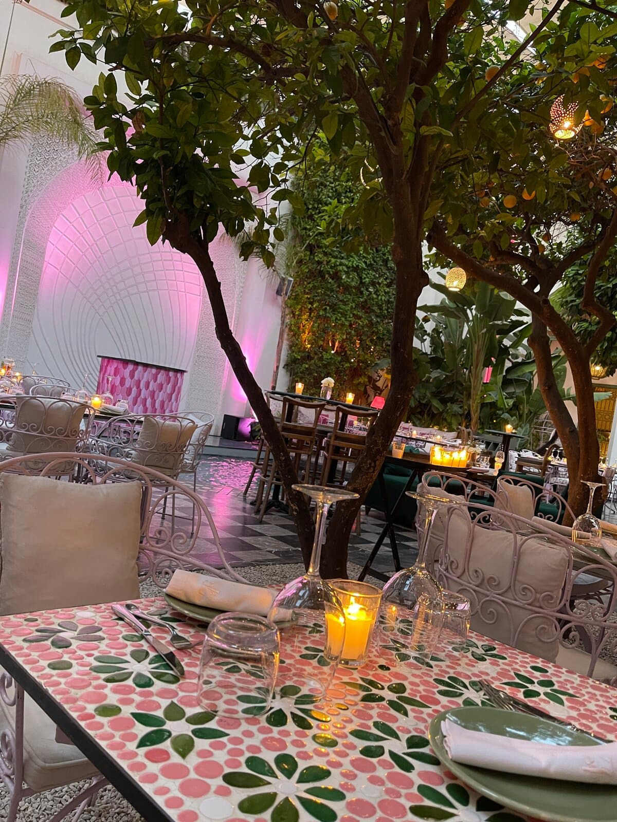 Les Jardins du Lotus courtyard at night